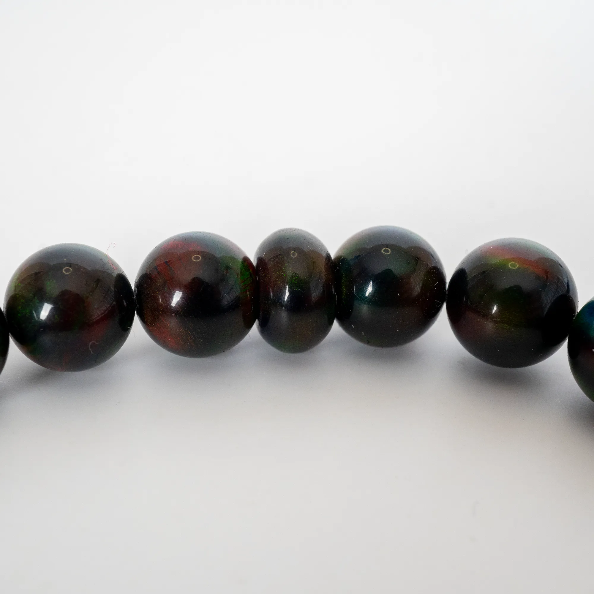 Black Ember Opalescence Beaded Bracelet