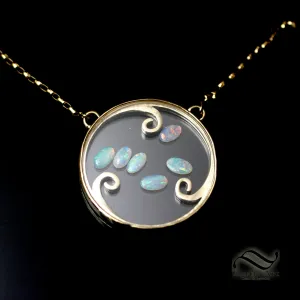 Kinetic Opal Pendant in 14k yellow gold