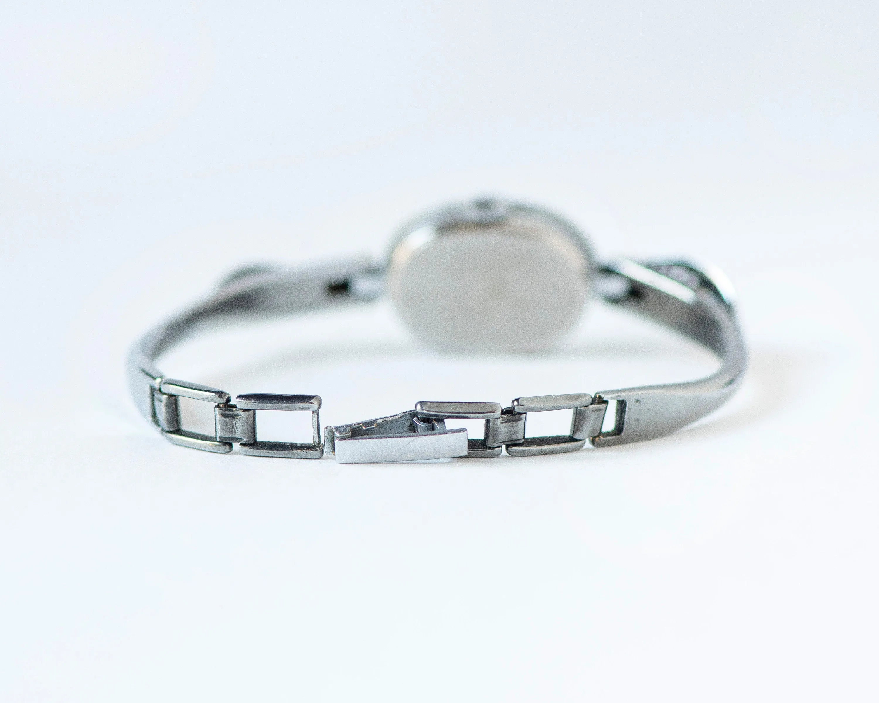 Mint condition women cocktail watch oval blue dial leaf trim on bangle, vintage watch for women Ray silver shade, classic jewelry bracelet